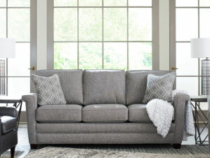 Bexley Sofa with Contrasting Pillows and Nailhead